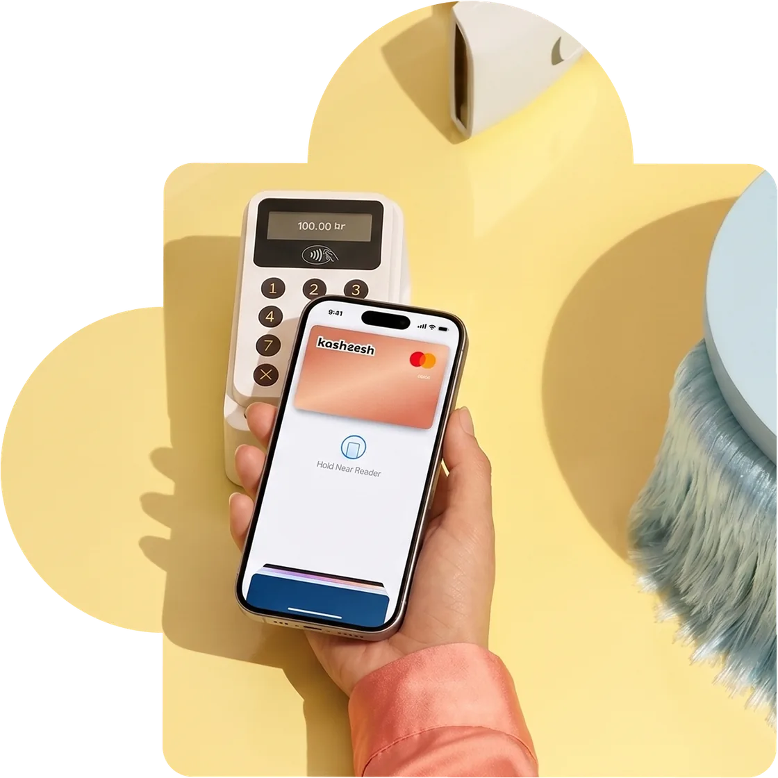 Paying with the Kasheesh card in a phone wallet at a card terminal